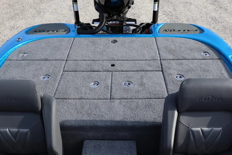 Slide: The Image of 2026 Falcon Boats F205 interior with gray carpet and seating. - 12