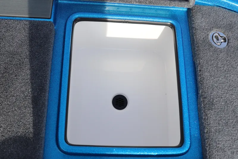 Slide: The Image of 2026 Falcon Boats F205 livewell with blue trim and gray carpet. - 15