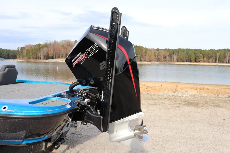 Slide: The Image of 2026 Falcon Boats F205 with Mercury Pro XS engine by a serene lake. - 20