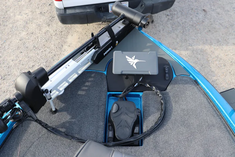 Slide: The Image of 2026 Falcon Boats F205 deck with Minn Kota trolling motor and control panel. - 3