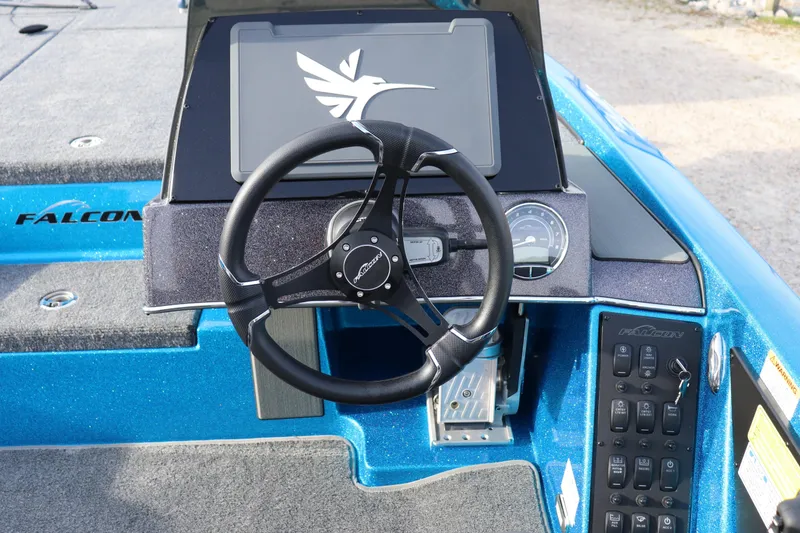Slide: The Image of 2026 Falcon Boats F205 dashboard with steering wheel and control panel. - 9