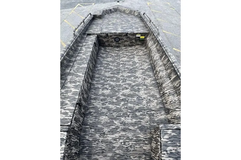 Slide: The Image of 2026 Havoc 1756 boat interior with camouflage pattern, showcasing spacious design. - 7