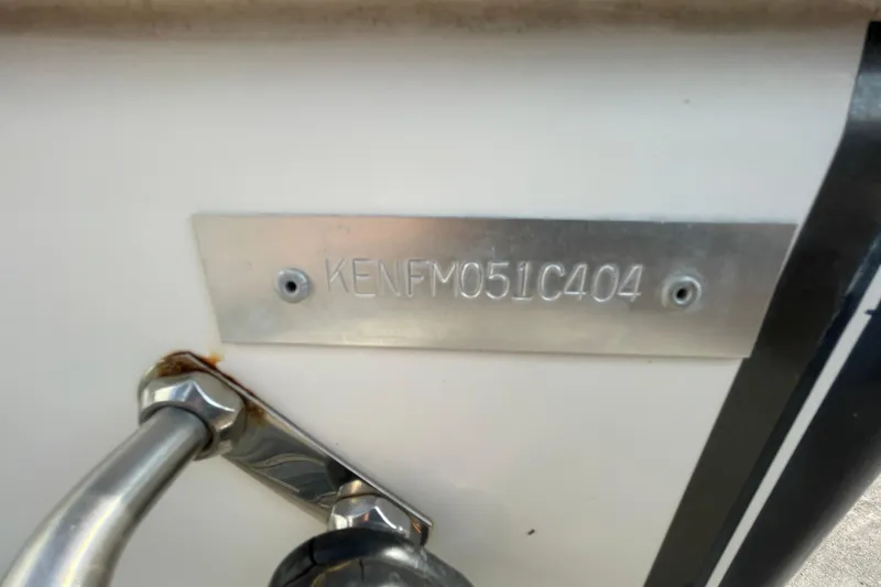 Slide: The Image of Hull identification number on 2004 Fishmaster Travis Edition 220 boat. - 67