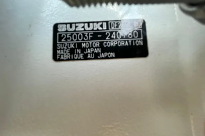 Slide: The Image of Label on Suzuki DF250 engine, made in Japan, for 2004 Fishmaster Travis Edition 220. - 68
