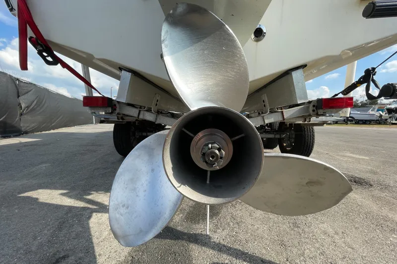 Slide: The Image of Close-up of a 2004 Fishmaster Travis Edition 220 boat propeller on a trailer. - 8