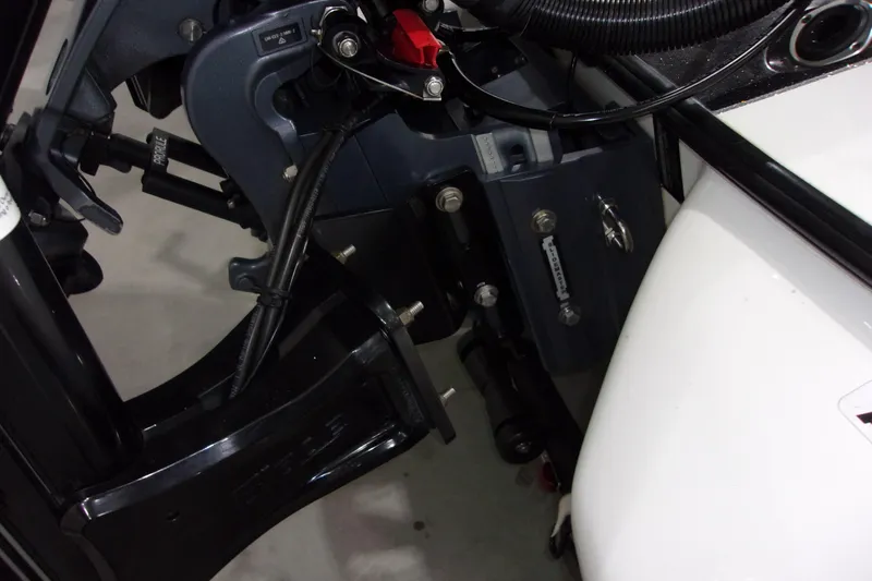 Slide: The Image of 2020 Skeeter FXR21 Limited boat engine components and wiring close-up. - 8