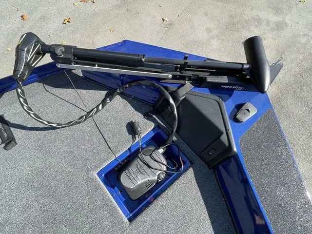 Slide: The Image of 2023 Crestliner XFC 179 boat deck with Minn Kota trolling motor and foot pedal. - 10