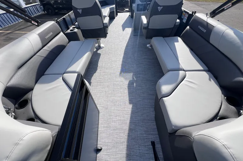 Slide: The Image of 2026 Viaggio V 20U boat interior with gray seating and modern design. - 20