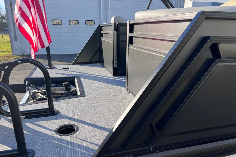 Slide: The Image of 2026 Viaggio V 20U boat deck with American flag, modern design, and sleek finish. - 23
