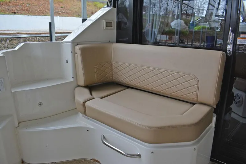 Slide: The Image of Luxurious interior of 2017 Sea Ray Sundancer 460 yacht with modern seating and helm. - 19