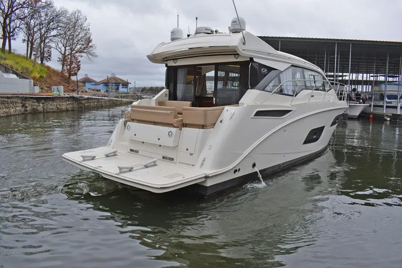 Slide: The Image of Interior of 2017 Sea Ray Sundancer 460 yacht with modern helm and seating area. - 22