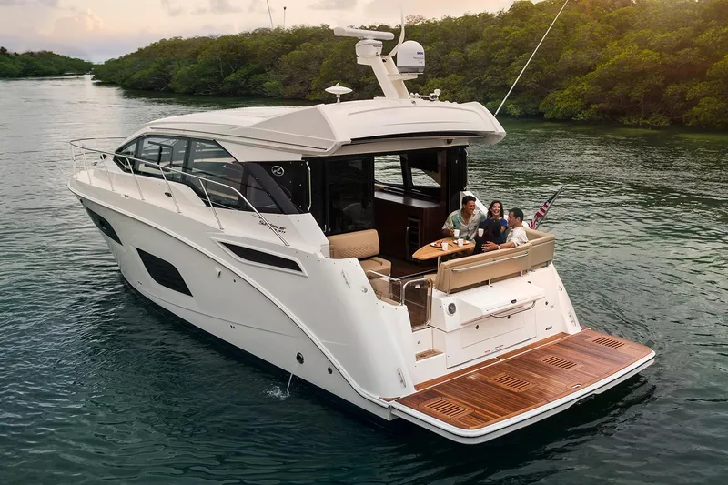 Slide: The Image of 2017 Sea Ray Sundancer 460 yacht docked in a covered marina. - 3