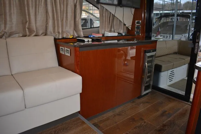 Slide: The Image of Engine room of 2017 Sea Ray Sundancer 460 with visible components and fire extinguisher. - 46