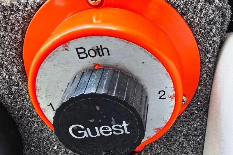 Slide: The Image of Battery selector switch on 1991 Rinker 236 Captiva Cuddy Cabin boat. - 16