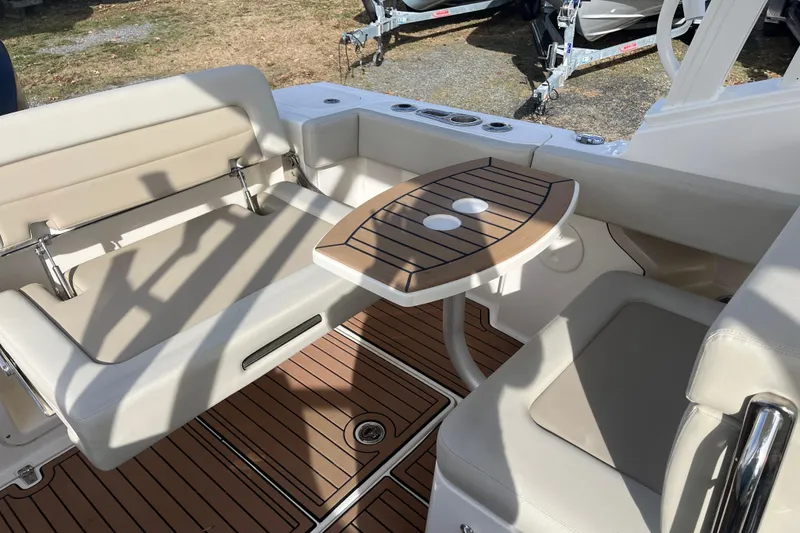 Slide: The Image of 2021 Boston Whaler 240 Vantage boat interior with helm and seating. - 15