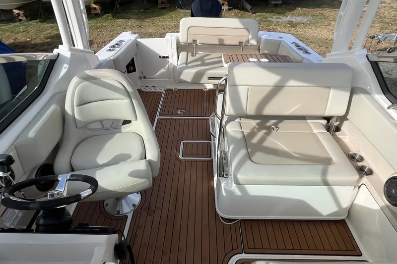 Slide: The Image of Spotlight control panel on 2021 Boston Whaler 240 Vantage boat dashboard. - 17