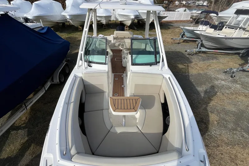 Slide: The Image of 2021 Boston Whaler 240 Vantage boat, top view, showcasing spacious seating and sleek design. - 2