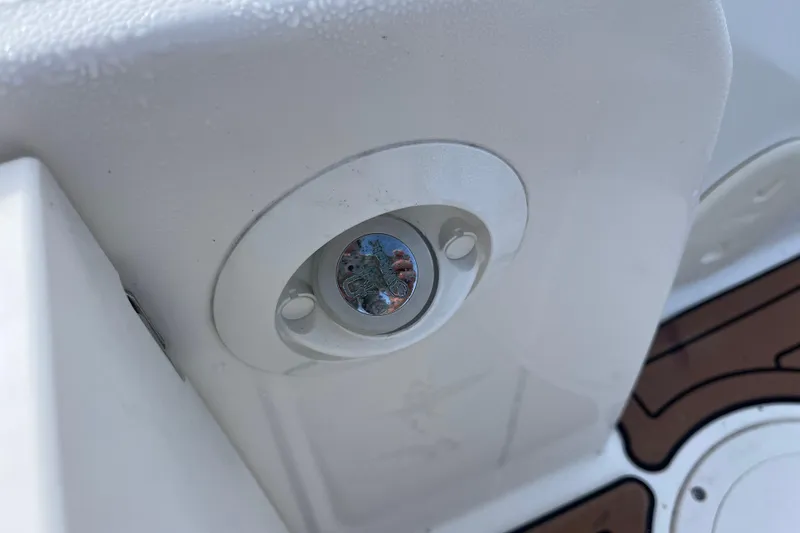 Slide: The Image of Open storage compartment on a 2021 Boston Whaler 240 Vantage boat. - 26