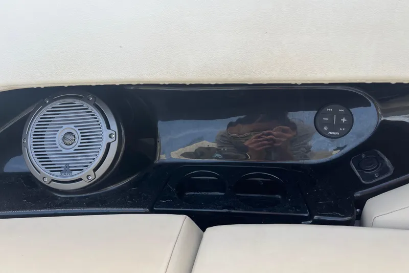 Slide: The Image of 2021 Boston Whaler 240 Vantage boat with Mercury outboard motor and teak-style decking. - 28