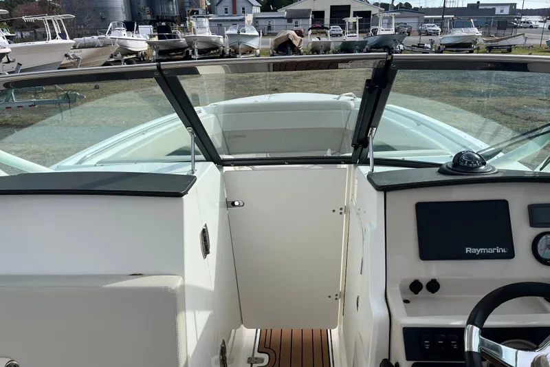 Slide: The Image of Boston Whaler 240 Vantage 2021 boat audio system with speaker and control panel. - 31