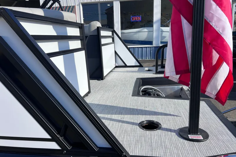 Slide: The Image of 2026 Viaggio V 20U boat deck with American flag, showcasing sleek design and open space. - 24