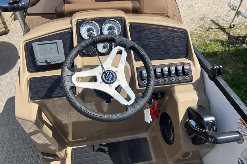 Slide: The Image of Steering console of 2026 Sylvan Mirage Fish 820 Party Fish boat with gauges and controls. - 16