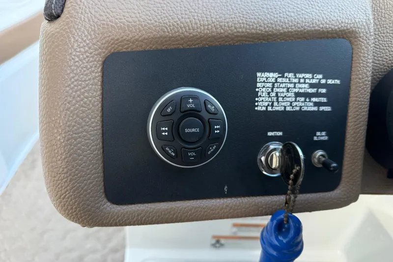 Slide: The Image of 2015 Cobalt 200 dashboard with control panel and safety warning text. - 13