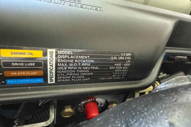 Slide: The Image of Engine specifications label on a 2015 Cobalt 200, detailing displacement and RPM. - 19