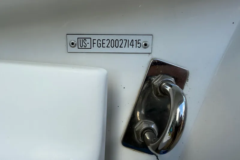 Slide: The Image of 2015 Cobalt 200 boat identification plate and handle detail. - 21