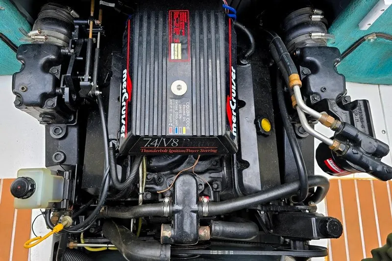 Slide: The Image of 1995 Sea Ray 240 Bow Rider engine, MerCruiser 7.4L V8, Thunderbolt ignition system. - 16