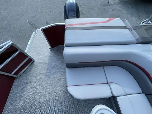 Slide: The Image of 2023 Bennington 20 SXL pontoon boat with stylish seating and modern design. - 8