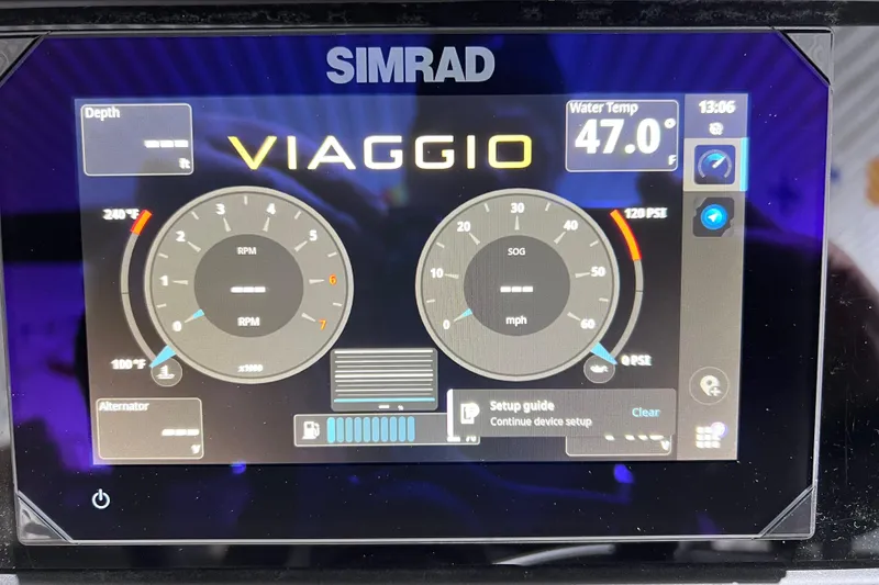 Slide: The Image of Viaggio X 22S Tritoon 2026 dashboard display with RPM, speed, and water temperature readings. - 12
