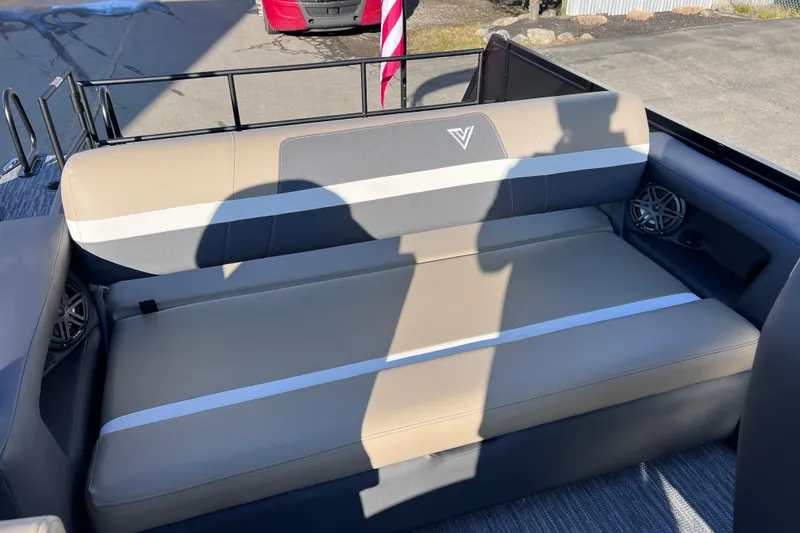 Slide: The Image of 2026 Viaggio X 22S Tritoon interior with beige seating and modern design. - 18