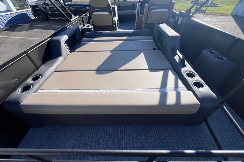 Slide: The Image of 2026 Viaggio X 22S Tritoon with spacious seating and cup holders. - 21
