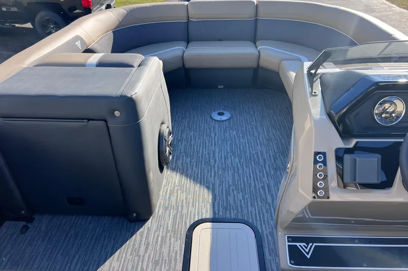 Slide: The Image of Interior of 2026 Viaggio X 22S Tritoon with spacious seating and modern dashboard. - 24