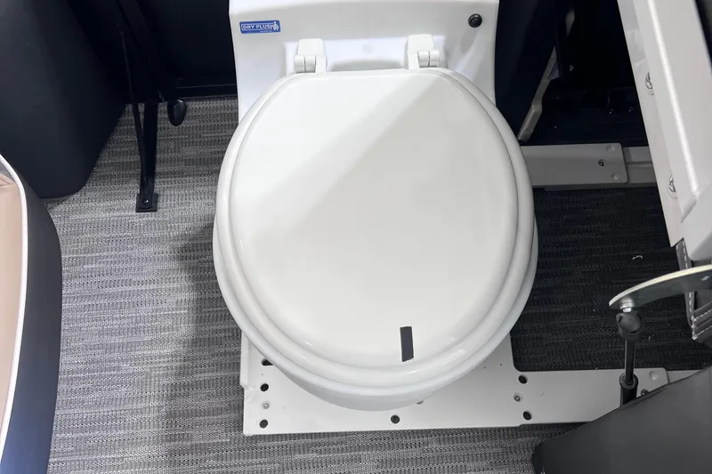 Slide: The Image of Toilet on 2026 Viaggio X 22S Tritoon boat, featuring a dry flush system. - 27