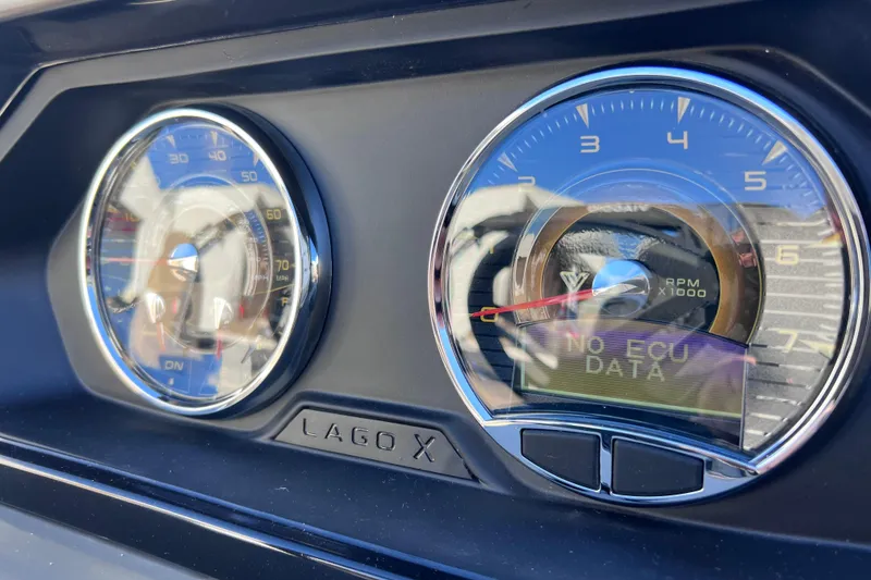 Slide: The Image of Dashboard of 2026 Viaggio X 22S Tritoon showing speedometer and tachometer. - 32