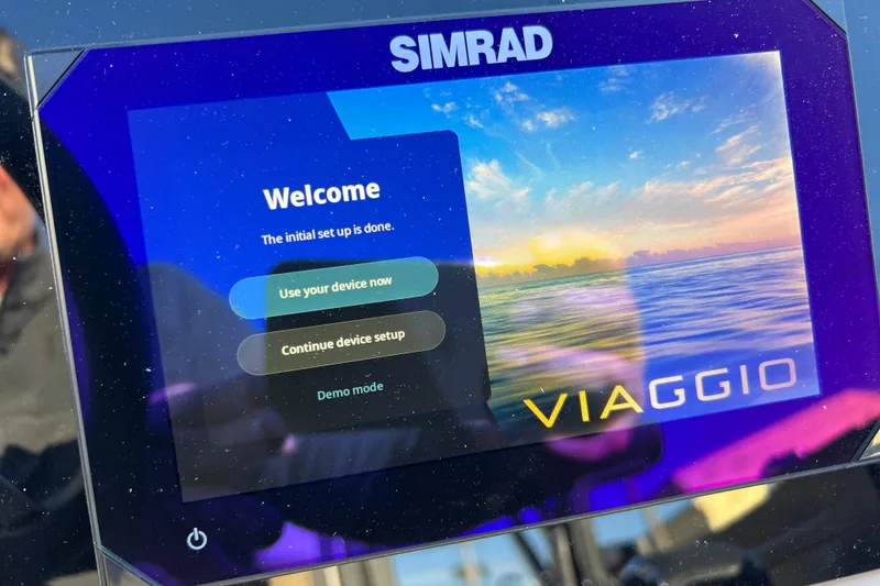 Slide: The Image of Simrad display on 2026 Viaggio X 22S Tritoon showing setup completion screen. - 34