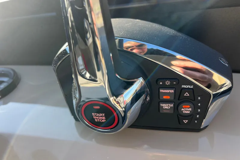 Slide: The Image of Control panel of 2026 Viaggio X 22S Tritoon with start engine button and trim controls. - 40
