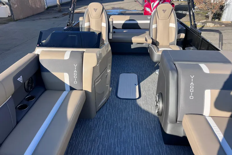 Slide: The Image of 2026 Viaggio X 22S Tritoon interior with beige and gray seating, modern design. - 43