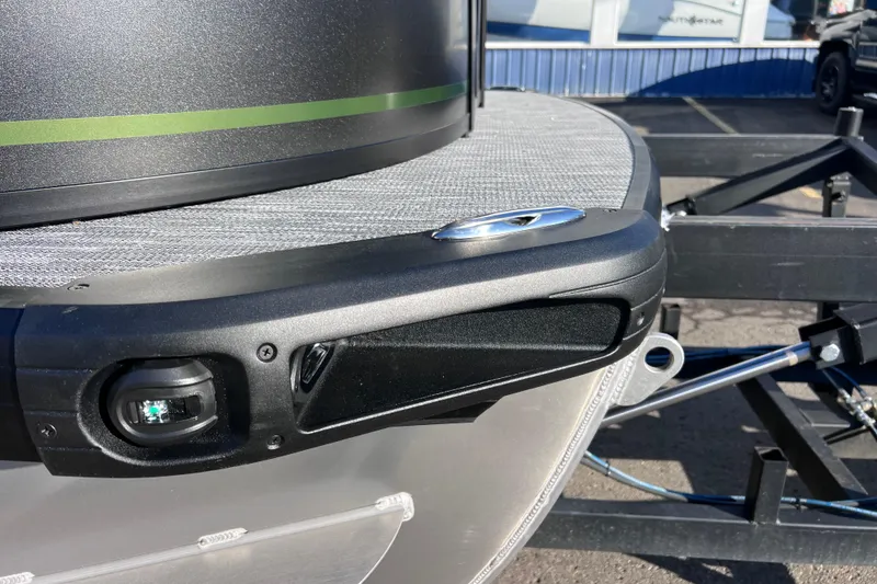 Slide: The Image of Close-up of 2026 Viaggio X 22S Tritoon boat detail, featuring sleek design and modern fixtures. - 6