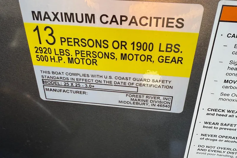 Slide: The Image of 2024 Berkshire 25RFX STS boat capacity label, 13 persons or 1900 lbs, 500 HP motor. - 16