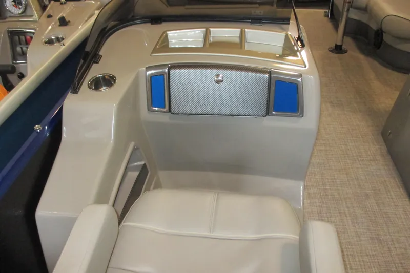 Slide: The Image of 2016 Premier 230 SunSation Echo RF boat interior with seating and control panel. - 11
