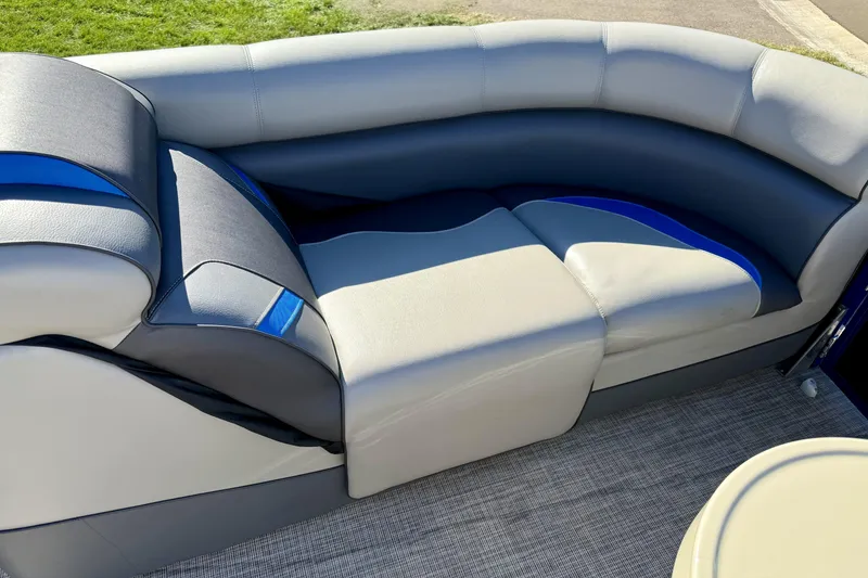 Slide: The Image of 2016 Premier 230 SunSation Echo RF boat seating with gray and blue upholstery. - 14
