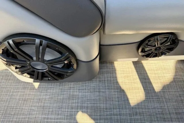 Slide: The Image of Speakers on a 2016 Premier 230 SunSation Echo RF boat with gray upholstery. - 23