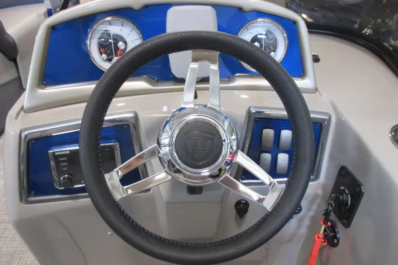 Slide: The Image of Steering wheel and dashboard of 2016 Premier 230 SunSation Echo RF boat. - 24