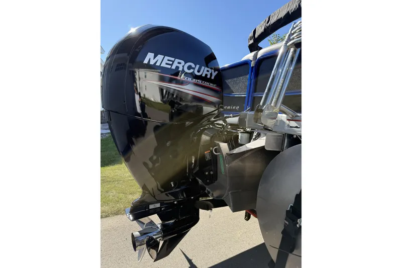 Slide: The Image of Mercury outboard motor on 2016 Premier 230 SunSation Echo RF boat, sunny day. - 9