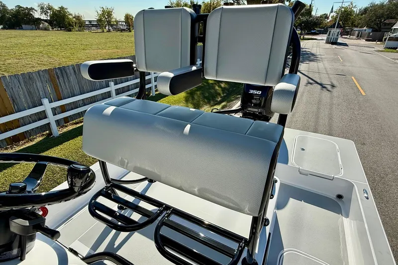 Slide: The Image of 2026 Shallow Sport 25 X3 boat with elevated seating and spacious deck. - 9