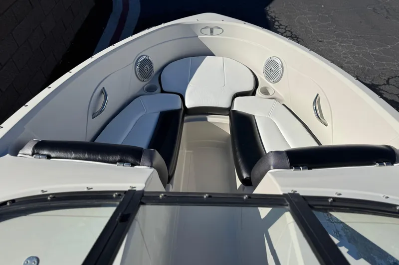 Slide: The Image of Interior view of 2016 Tahoe 500 TS boat with white and black seating. - 11