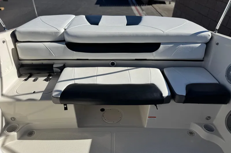 Slide: The Image of 2016 Tahoe 500 TS boat interior with white and black seating. - 15